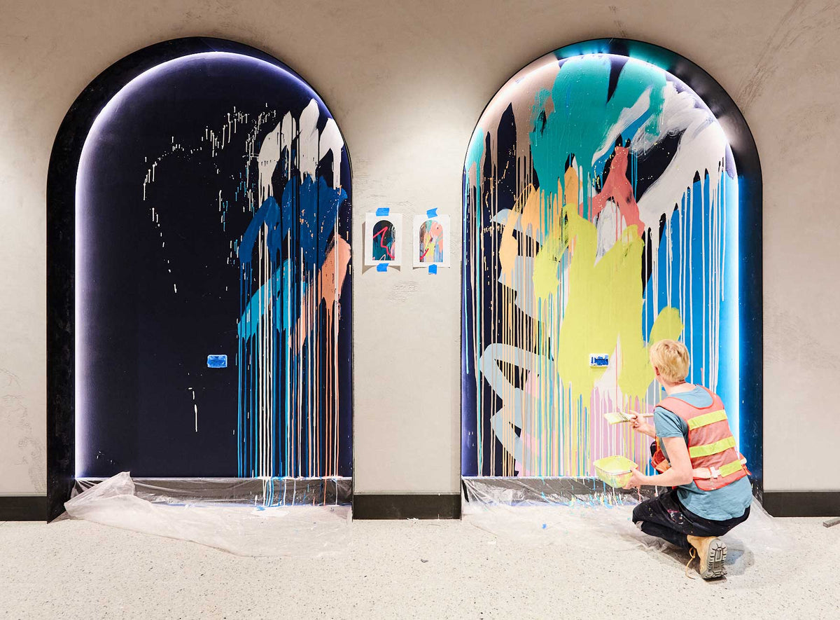 Large-scale Rowena Martinich mural in an architectural setting